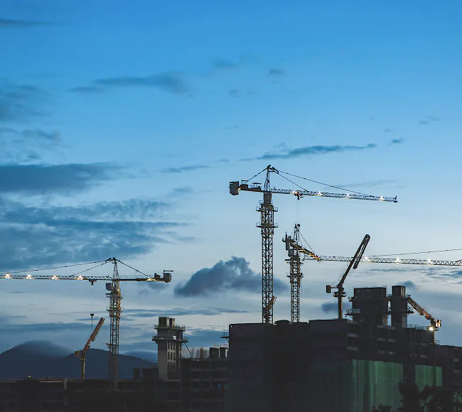 Construction cranes on a civil development site