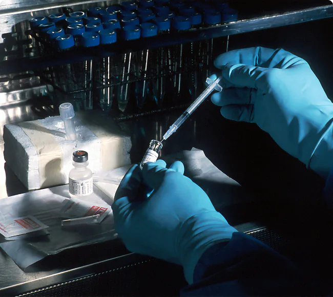 Researcher conducting environmental laboratory testing