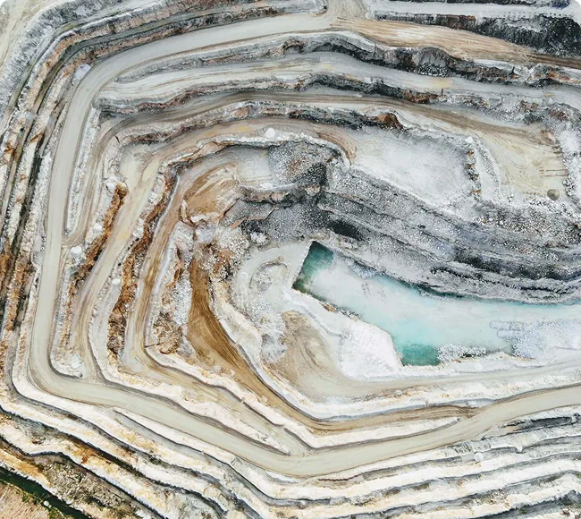 Aerial view of a large open-cut mine and quarry